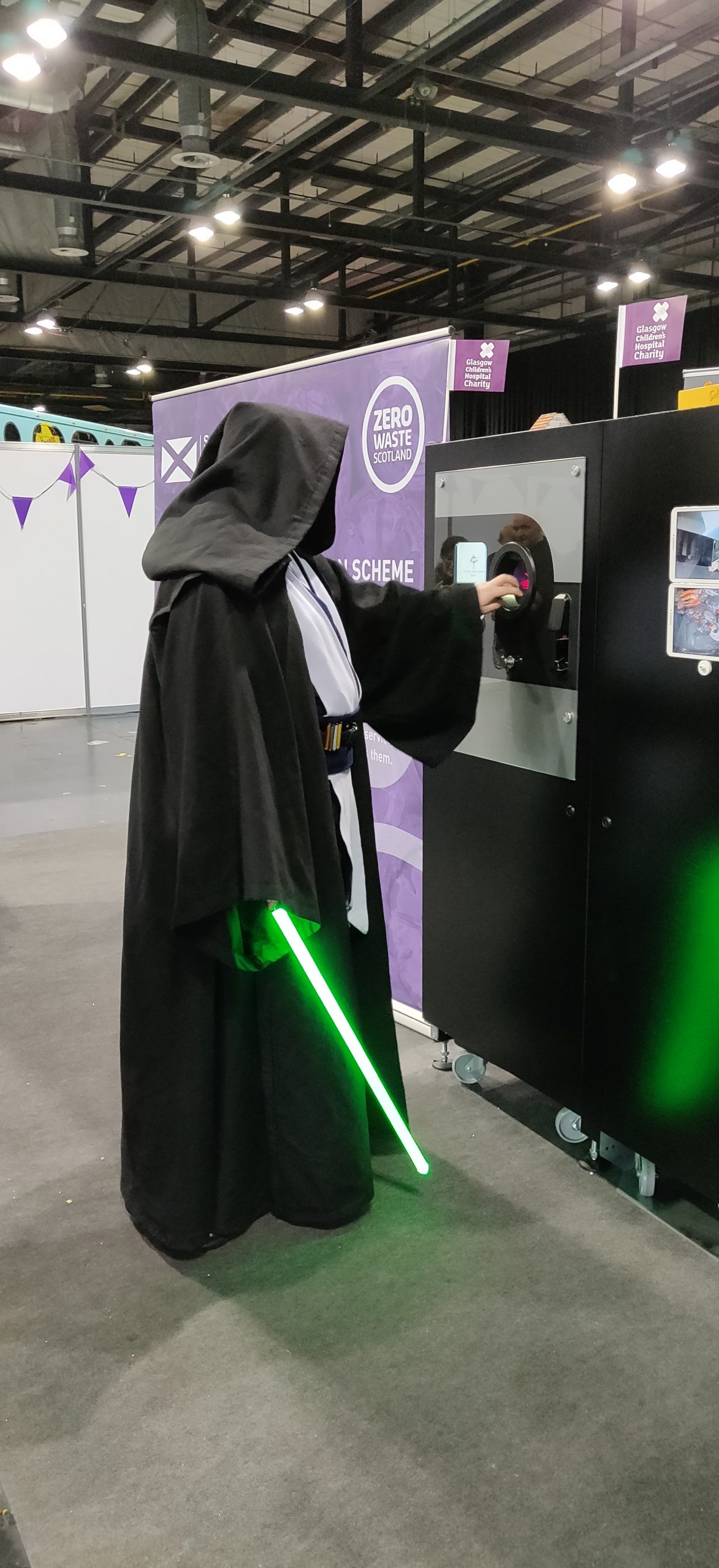 Obi Wan Kenobi using the Reverse Vending at Zero Waste Scotland Stand