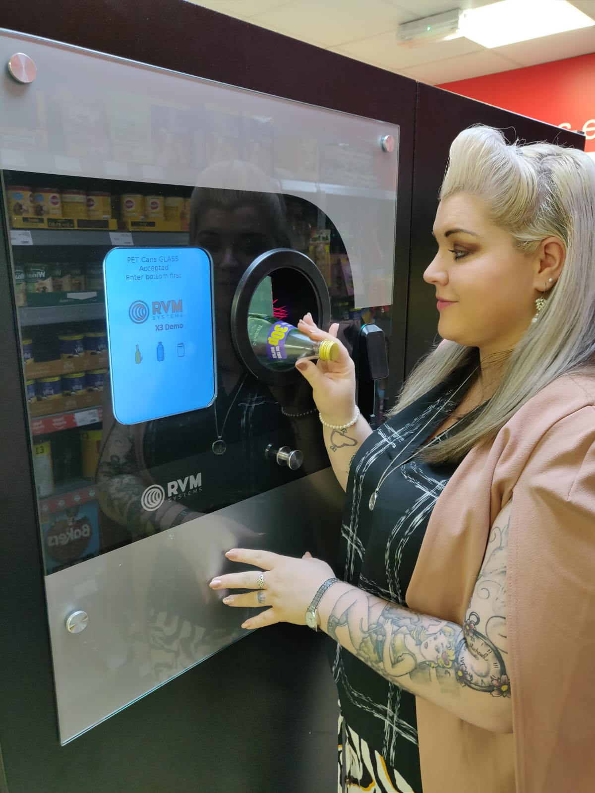 Stephanie Gray using the DRS ready Reverse Vending Machine